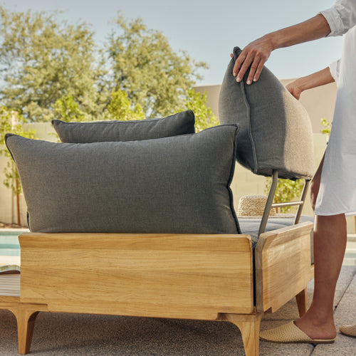 A studio photo of Bluff Sectional with End Table Sunbrella Parchment / Four Piece with In-line End Table