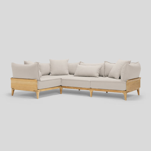 A studio photo of Bluff Sectional Sunbrella Parchment / Four Piece