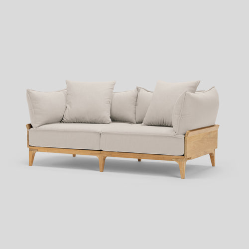 A studio photo of Bluff Loveseat Sunbrella Parchment