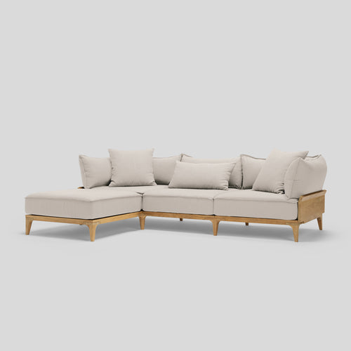 A studio photo of Bluff Chaise Sofa Sunbrella Parchment / Sofa with Chaise