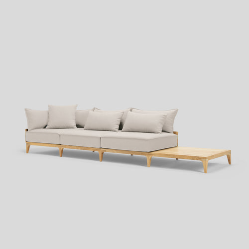 A studio photo of Bluff Sofa with End Table Sunbrella Parchment