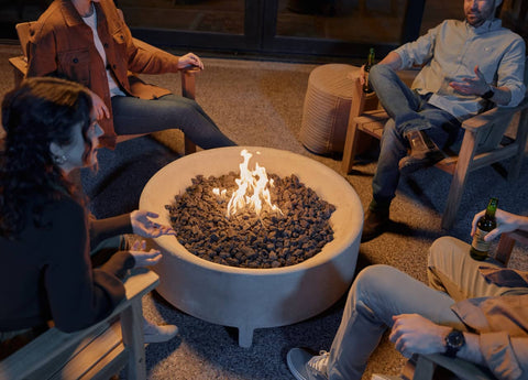 People gathered around the Rook Fire Table