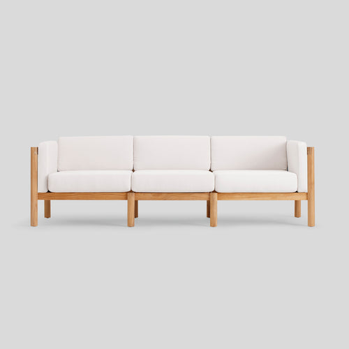 A studio photo of Haven Sofa Sunbrella Canvas / Cushion Arm